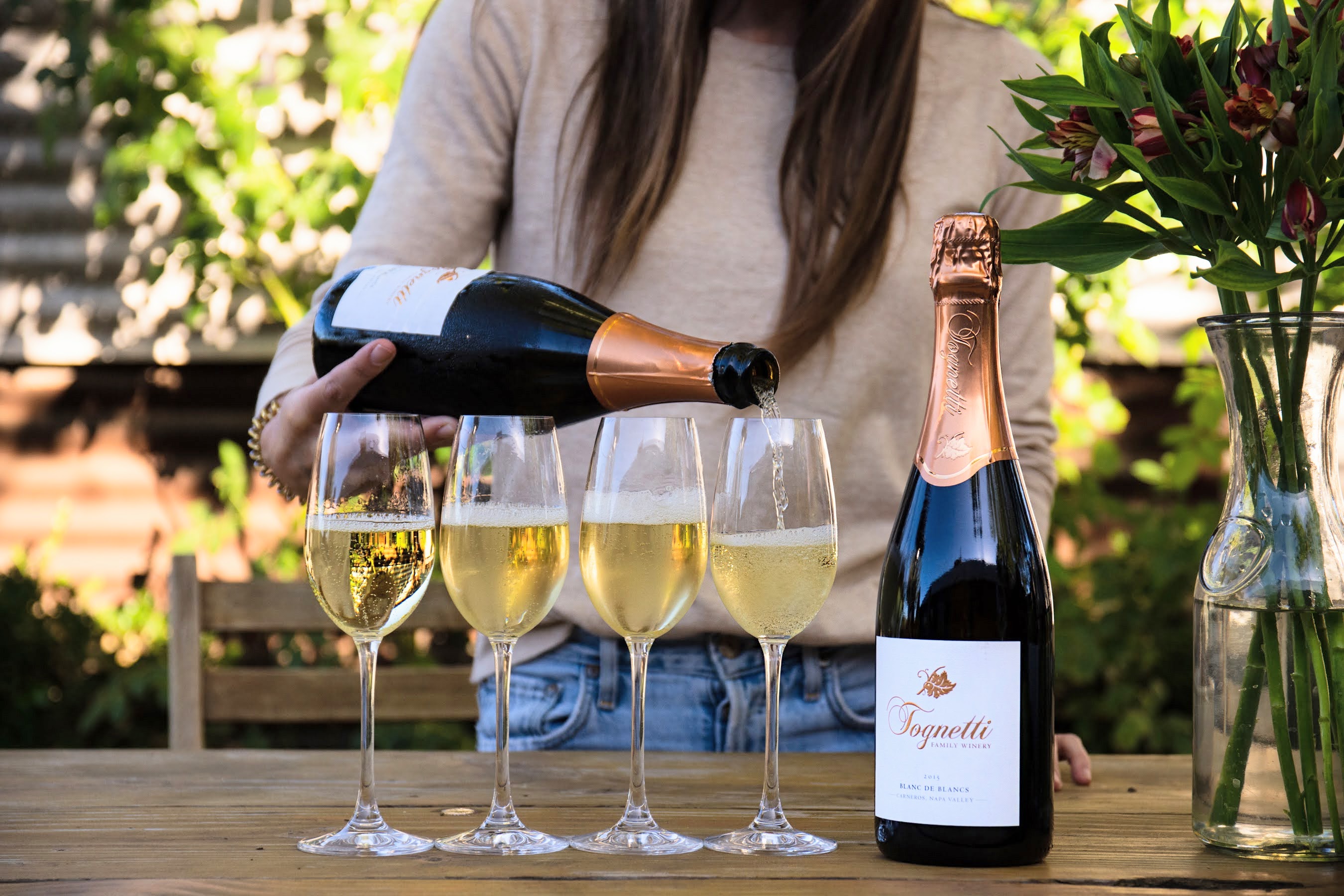 Sparkling wine being poured into glasses